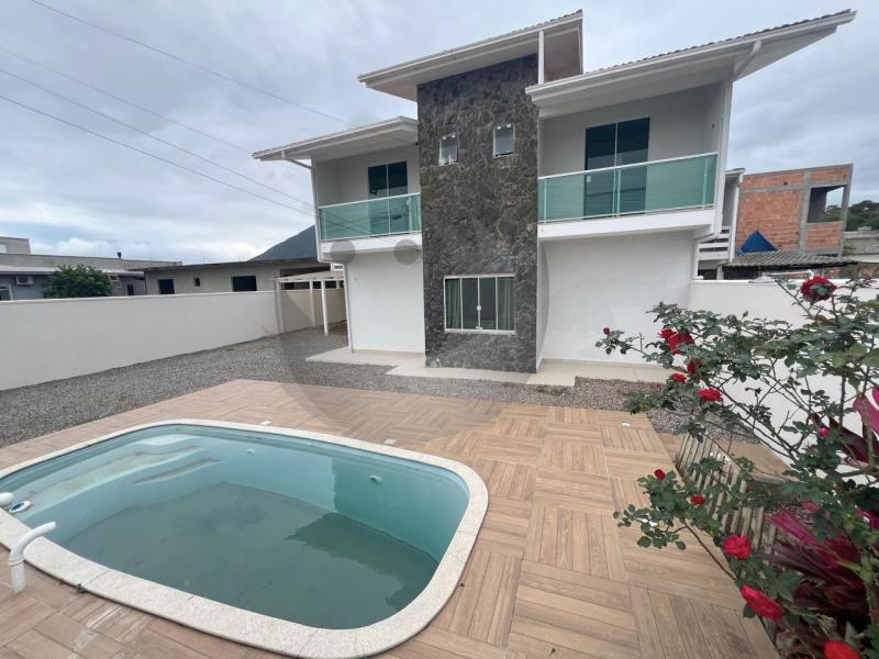 Casa Código 6036 a Venda no bairro Guarda do Cubatão na cidade de Palhoça Condominio 